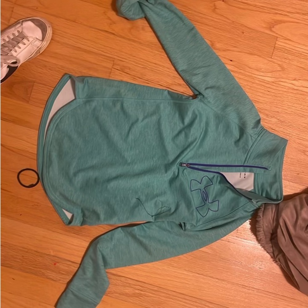 Unused, clean, wind resistant, thin light coat, great for chilly, cold days